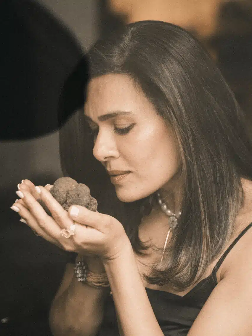 Hajira Ahmad of Black Gold Experiences holding a fresh truffle