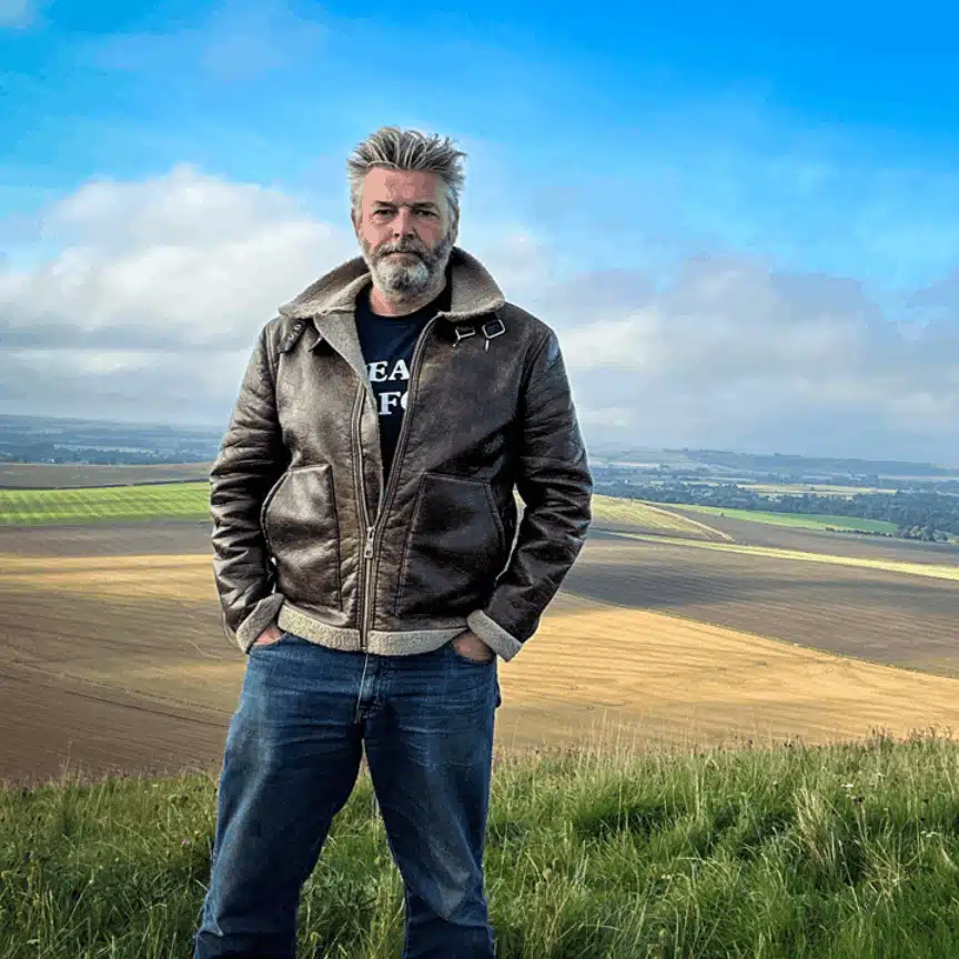 Tom Radford of Eat The Country standing on the downs